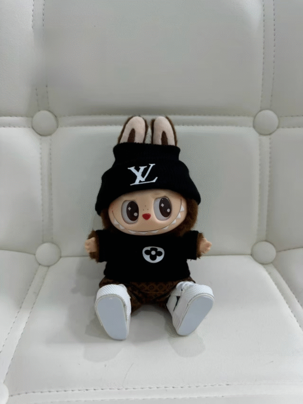 labubu is wearing a black lv sweater